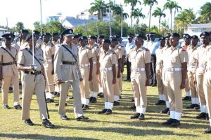 Outgoing Police Commissioner Seelall Persaud inspecting officers who were part of the parade yesterday. (DPI photo)