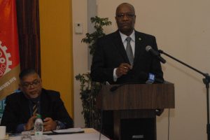 Minister of State Joseph Harmon addressing the GMSA’s Annual General Meeting on Wednesday. Seated next to Minister harmon is GMSA Executive Meneber Ramesh Dookoo