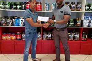 President of the GBBFFI, Coel Marks (right) receiving the sponsorship cheque from Fitness Express’ CEO, Jamie McDonald recently at the company’s store at 47 John and Sheriff Streets.

