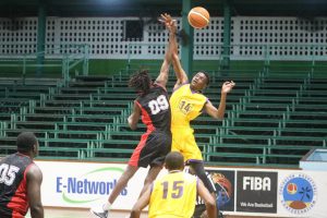 Action in the second division clash between Kobras and Pacesetters in the Georgetown Amateur Basketball Federation (GABA) knockout tournament at the Cliff Anderson Sports Hall, Homestretch Avenue, Monday.