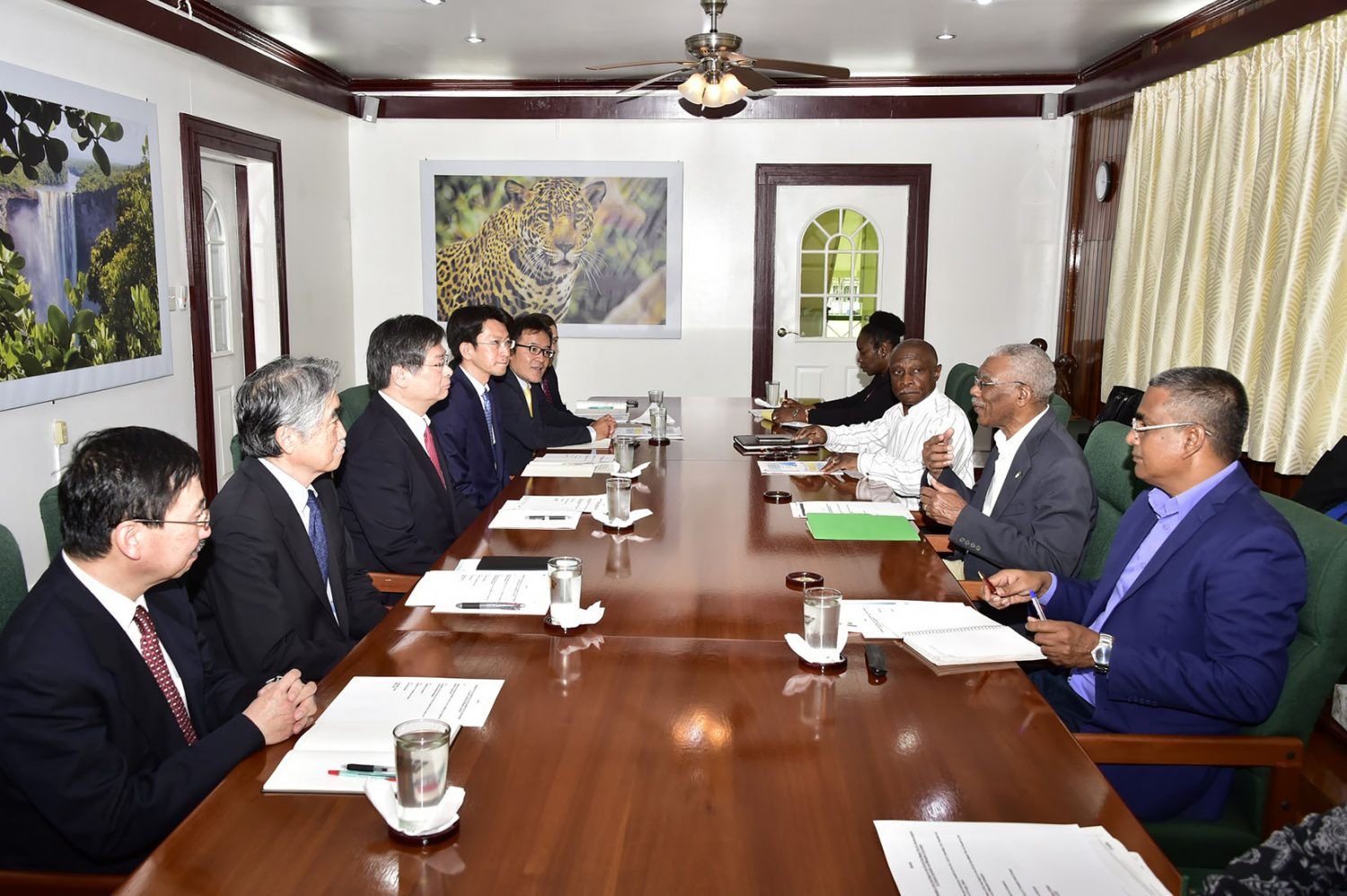 President David Granger (second, from right) and other government officials meeting with representatives of Chiyoda Corporation and Mitsubishi Corporation (seated at left) at State House on Friday. (Ministry of the Presidency photo)
