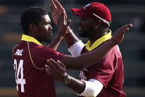 Keemo Paul (left) is congratulated by Ashley Nurse after taking a wicket
during his maiden ODI on Thursday. 