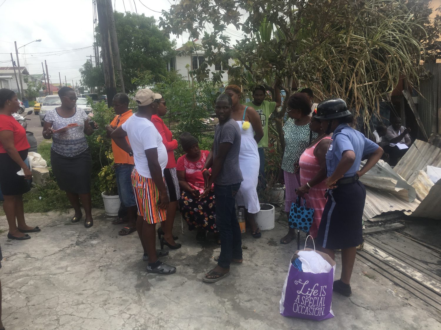 Residents and neighbours gathered today as they tried to assess the total losses. 