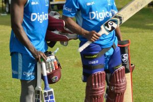 Rovman Powell, left and Evin Lewis after net sessions yesterday as they prepare to face Scotland today in another must win encounter. (Photo courtesy Cricket West Indies)