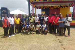 Members of the PPP/C Central Committee, cyclists and organisers gather to commemorate the anniversary of the late former president Dr. Cheddi Jagan. (Romario Samaroo photo)