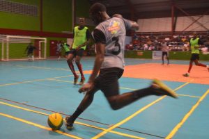 Jeremy Garrett of Sparta Boss, in the process of unleashing a powerful left foot strike against Mocha at the National Gymnasium