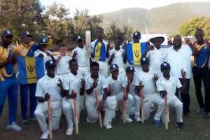 Members of the Barbados Under-15 team and support staff pose for a photo following their capture of the Regional Under-15 title. 
