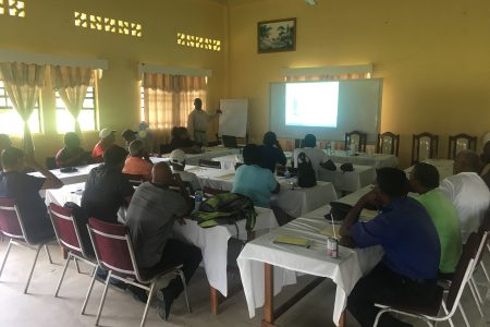 James Thomas, Senior Assistant Field Manager of the East Demerara Estate, conducting the training session for the ex-sugar workers yesterday at the Wales Estate Staff Club and Training Centre. 