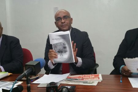 Former President Bharrat Jagdeo (centre) speaking at the press conference yesterday. Also in photo are PPP/C MPs Juan Edghill (left) and Irfaan Ali.