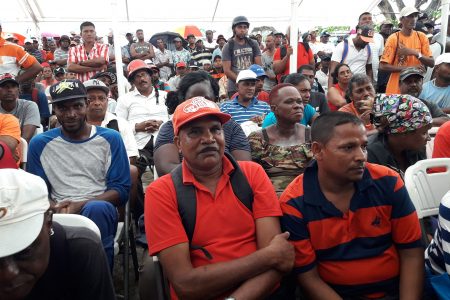 Former sugar workers gathered at Line Path yesterday to receive hampers