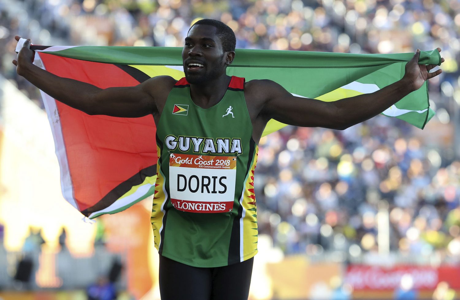 Guyana’s Troy Doris celebrates after winning in the men’s triple jump final at Carrara Stadium during the 2018 Commonwealth Games on the Gold Coast, Australia, Saturday, April 14, 2018. (AP Photo/Mark Schiefelbein)