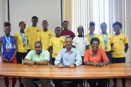 In his first official press conference following the Flow CARIFTA Games, President of the Athletic Association of Guyana (AAG), Aubrey Hutson (seated centre) commended the athletes for being great ambassadors for the nation while in The Bahamas.