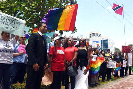 Members and supporters of the LGBT community outside the Parliament Building. (Trinidad Express)