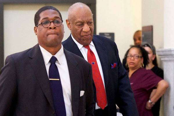 Bill Cosby (second from left), once beloved ‘America’s Dad,’ convicted of sexual assault | Reuters