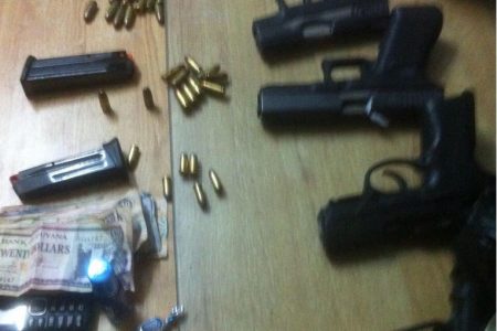The guns and ammunition found (Police photo)
