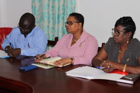 (From left to right) Permanent Secretary Ministry of Communities, Emil McGarrel, Minister of Public Health Volda Lawrence and the Permanent Secretary Ministry of Communities Colette Hicks