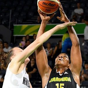 Jennifer George (right) contests a ball during the game against New Zealand. 
