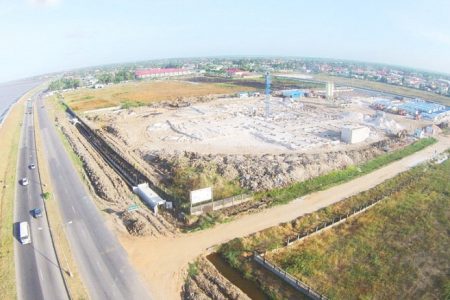 (November 2015:  An aerial shot of the large-scale construction works that are ongoing at the site of the US$30M MovieTowne Guyana complex at Turkeyen, East Coast Demerara.)