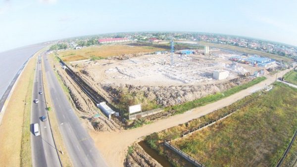 (November 2015:  An aerial shot of the large-scale construction works that are ongoing at the site of the US$30M MovieTowne Guyana complex at Turkeyen, East Coast Demerara.)