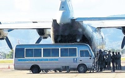 A military aircraft at Piarco International Airport waiting to take Venezuelan immigrants back to their homeland yesterday. PICTURE MINISTRY OF NATIONAL SECURITY