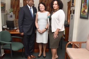 First Lady, Sandra Granger (centre) is flanked by, from left, Director of International Education at the Medgar Evers College, Prof. Eugene Pursoo and Interim Director of the Caribbean Research Centre, Maria DeLongoria, at her State House office.  (Ministry of the Presidency photo)