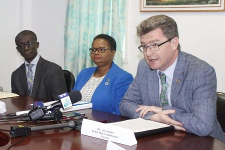From right are British High Commissioner to Guyana Greg Quinn, Minister of Public Health Volda Lawrence and PAHO/WHO Representative to Guyana Country Office Dr. William Adu-Krow. (Department of Public Information photo)