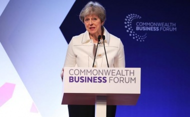 Britain's Prime Minister Theresa May speaks at a Commonwealth Heads of Government Meeting business forum in London, April 16, 2018. REUTERS/Hannah McKay