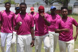 Seamer Qumar Torrington leads his peers off after bowing his side into a position of strength at the halfway point.