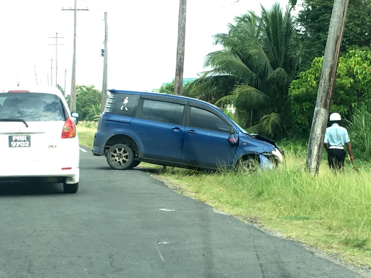 An early morning accident yesterday on the East Coast Railway Embankment as the driver of the vehicle at right was heading east which is not permitted between 7 am and 9 am.