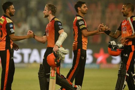 Kane Williamson and  Shikhar Dhawan are congratulated by their teammates after winning the tie (Photo courtesy of IPL website)
