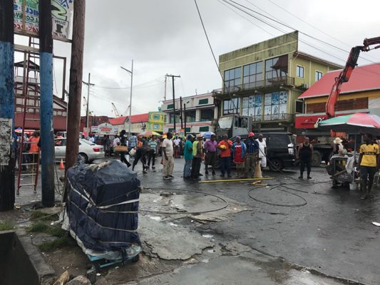 Guyana Power and Light workers and spectators gathered at the scene yesterday where Nara Singh was shocked. 