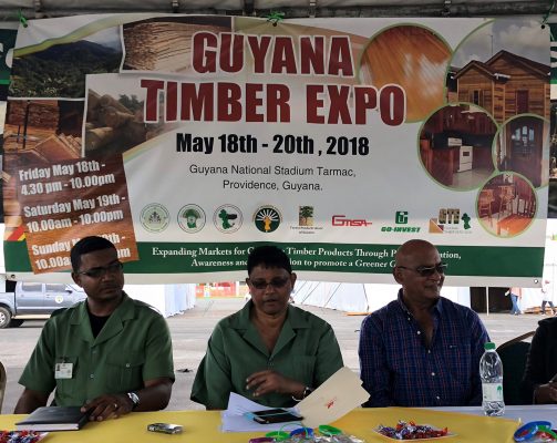 Commissioner of the Guyana Forestry Commission James Singh (centre), along with the Manager of the Forest Products Development Marketing Council of the GFC Kenny David (left) and one of the exhibitors at yesterday’s press conference at the Guyana National Stadium, Providence. 