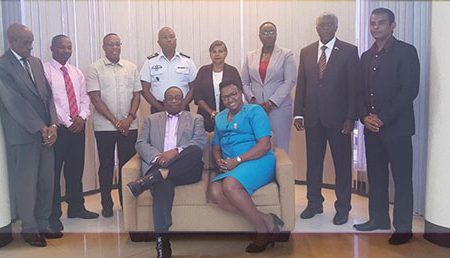 Minister within the Minister of Public Infrastructure Annette Ferguson (seated at right), and Chairman of the new GCAA Board Lt. Col (Ret’d) Lawrence London (seated left) are flanked by other members of the new Board of Directors. 