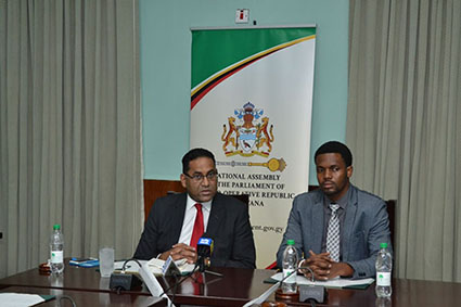 Commonwealth Parliamentary Association (CPA) Secretary-General, Akbar Khan (left) and acting PRO for Parliament, Yannick December. (Department of Public Information photo)