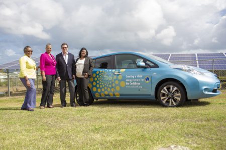From left to right with the vehicle are Tessa Williams Robertson, Head, Renewable Energy and Energy Efficiency Unit; Monica La Bennett, Vice-President (Operations); Dr. William Warren Smith, President; and Yvette Lemonias Seale, Vice-President (Corporate Services) and Bank Secretary during a photo opportunity at the CDB’s Headquarters in Barbados.