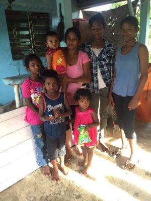 Dhanrajie Seebarran (holding baby) and her children 
