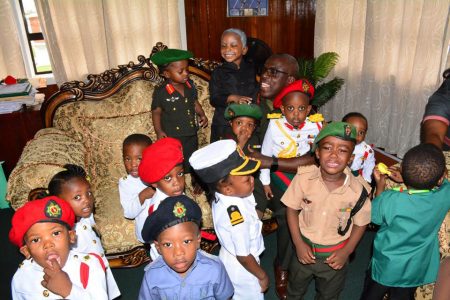 Toddlers of the GDF Margaret Rose Arthur Day Care Centre, recently visited the office of GDF Chief of Staff, Brigadier Patrick West as a part of their career day activity.  The preschoolers were decked out in the uniforms of various ranks in the army. Two preschoolers went the extra mile and replicated the look of Commander-in-Chief, President David Granger and the GDF’s Chief of Staff. (Guyana Defence Force photo by Lance Corporal Kenneth Richards)