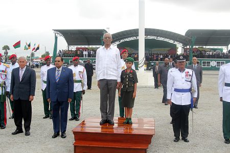 President David Granger standing on the podium, along with the student dressed as an army officer for her school’s career day. To their left left are Social Cohesion Minister George Norton and Prime Minister Moses Nagamootoo, while acting Commissioner of Police David Ramnarine is at right.  (Photo by Terrence Thompson)