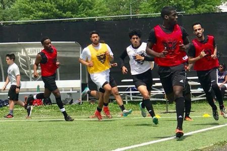 Jeremy Garrett leading the pack during a warmup session at his recent audition for American football club DC United 