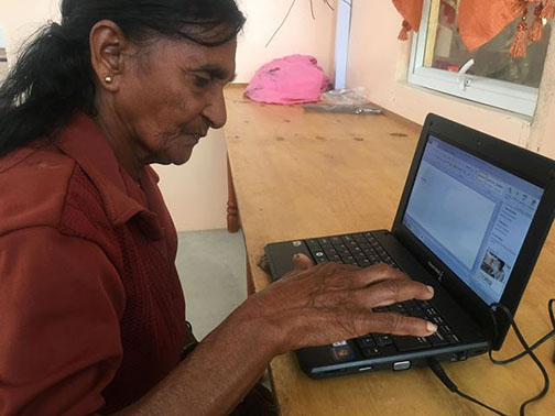 Purnamattie Mangra as she types her name (DPI photo)