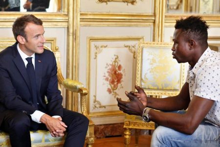 Mamoudou Gassama (right) with France’s President Emmanuel Macron yesterday