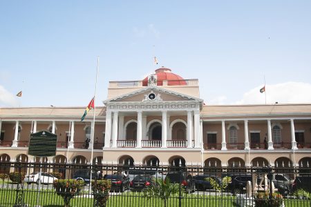 Day of mourning: The flag of Guyana at half-staff at Public Buildings in observance of yesterday’s national day of mourning for the victims of the piracy attack off of Suriname on April 27th , 2018 and May 3rd, 2018.  Four bodies were retrieved and another 12 Guyanese are missing and presumed dead. President David Granger issued a proclamation to this effect on Friday. He called on all authorities, board, commissions, corporations, public agencies, ministries and citizens to fly the national flag at half-staff to demonstrate solidarity with the families of those killed. (Terrence Thompson photo)