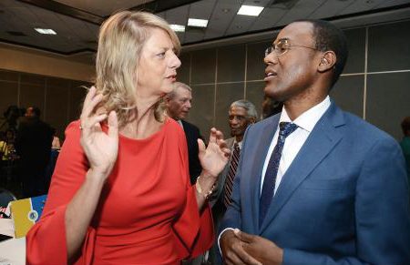 Laurie Peters, Canada’s High Commissioner to Jamaica, makes a point to Dr Nigel Clarke, Minister of Finance and the Public Service, at the launch of the Caribbean Leadership Project at The Jamaica Pegasus Hotel in St Andrew, on Friday. (Kenyon Hemans photo).