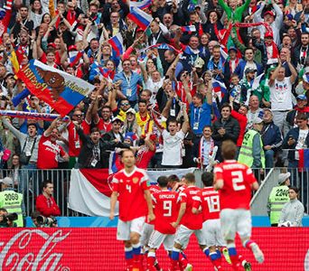 The Russian players and crowd celebrate another goal in their 5 – 0 drubbing of Saudi Arabia in the opening game of the 2018 World Cup yesterday in Moscow. (Photo courtesy of FIFA.com)