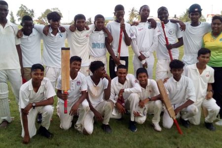 The Hope Secondary School cricket team is all smiles yesterday, following their first innings victory over Friendship Secondary School in the third place playoff match in the Regional Democratic Council/ Lloyd Britton/ Devcon Construction/ Regional Executive Officer Region Four Inter-Secondary Schools competition at the Everest Cricket Club. Scores: Friendship Secondary 89 all out (Adrian Lim, 31, Deosarran Narine, 6/15) and 61/6 (Damian Smith, 25*). Hope Secondary 171/9 (Daniel Mohan, 23; Joshua Blackman, 22; Extras, 50). Diamond Secondary and Annandale Secondary clash in today’s final at the same venue at 9:00 hrs.
