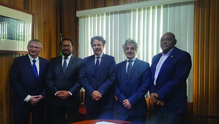 Repsol Director (Global New Ventures) Mikel Erquiaga (second, from right) and a team from the company with Minister of Natural Resources Raphael Trotman (at right), whom they met last month. During the meeting, they are reported to have reiterated Repsol’s commitment to its Guyana operations and an aggressive programme of activities that would move swiftly from seismic surveys to exploratory drilling. (Ministry of Natural Resources photo)