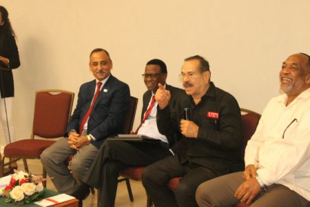 University of the West Indies Professor Emeritus of Mechanical Engineering, Clement Imbert as he interacted with the audience. He is flanked by other panellists.
