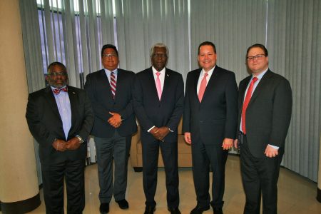Director General, Lt. Col. (Ret’d) Egbert Field (centre) flanked by American Airlines officials. (GCAA photo)