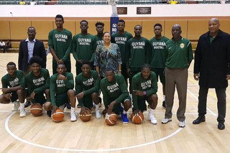 The Stanton Rose national men’s basketball team which scored the first ever series triumph over a Barbados national team in a Goodwill Series, pose for a photo opportunity following their triumph. Former national player and president of the Guyana Amateur Basketball federation Nigel Hinds is at right.