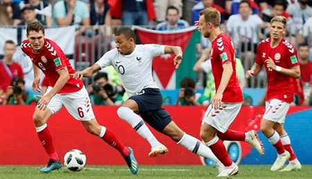 France’s Kylian Mbappe in action with Denmark’s Andreas Christensen and Christian Eriksen REUTERS/Maxim Shemetov